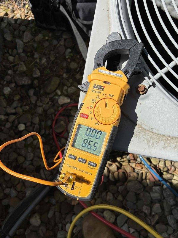 Performed preventive maintenance on two outdoor air conditioning condensing units. Conducted electrical diagnostics using digital multimeter and clamp meter, measuring voltage readings of 411.7V and verifying amp draw at 0.00A on system components. Inspected and tested all electrical connections, control boards, and wiring harnesses on both units to ensure proper operation for the cooling season.