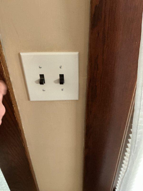 Installed new electrical junction box in attic space to address wiring concerns. Replaced dual toggle switch and cover plate, ensuring proper operation and secure mounting to wall surface.