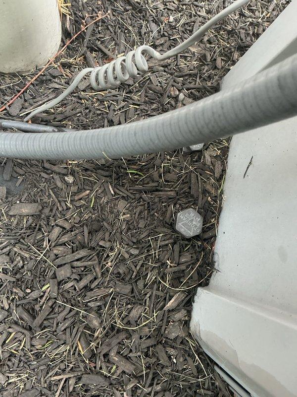 Responded to service call for reduced cooling capacity affecting entire home on 15-year-old air conditioning system. Performed comprehensive diagnostic evaluation and routine maintenance service on outdoor condensing unit. Upon inspection, found outdoor unit with significant debris accumulation, corrosion on electrical components, and heavy buildup of dirt, dust, and fibrous material obstructing airflow. Multiple wire connections showed signs of weathering and corrosion exposure. Cleaned condenser coil, removed debris from unit exterior and base, and inspected all electrical connections. Provided customer with equipment assessment and discussed replacement options given age and condition of existing system.