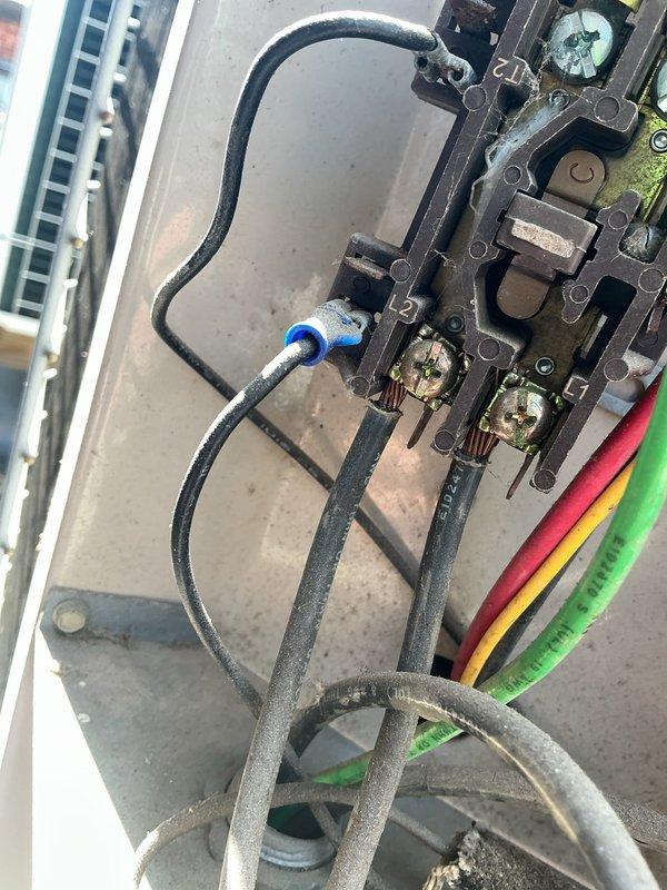 Completed routine cooling maintenance on rooftop HVAC unit. Inspected electrical connections at control panel, verified all terminal connections were secure, and checked wiring integrity across multiple circuits. All electrical components showed normal wear consistent with outdoor installation, with connections functioning properly and no immediate safety concerns identified.