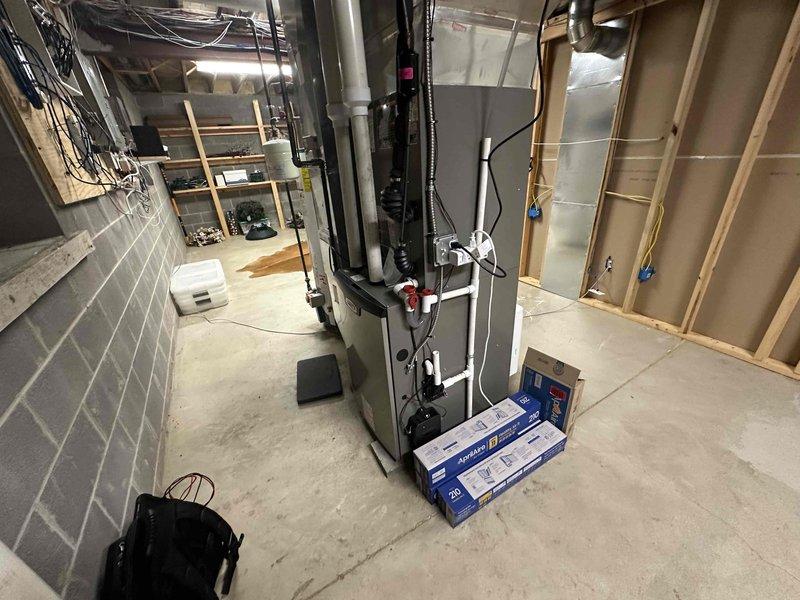 Completed annual cooling maintenance visit on residential HVAC system. Performed comprehensive inspection of furnace unit and blower assembly, verified proper operation of all mechanical components, and documented system condition through photographic records. All equipment found to be in satisfactory working order with no immediate service needs identified.
