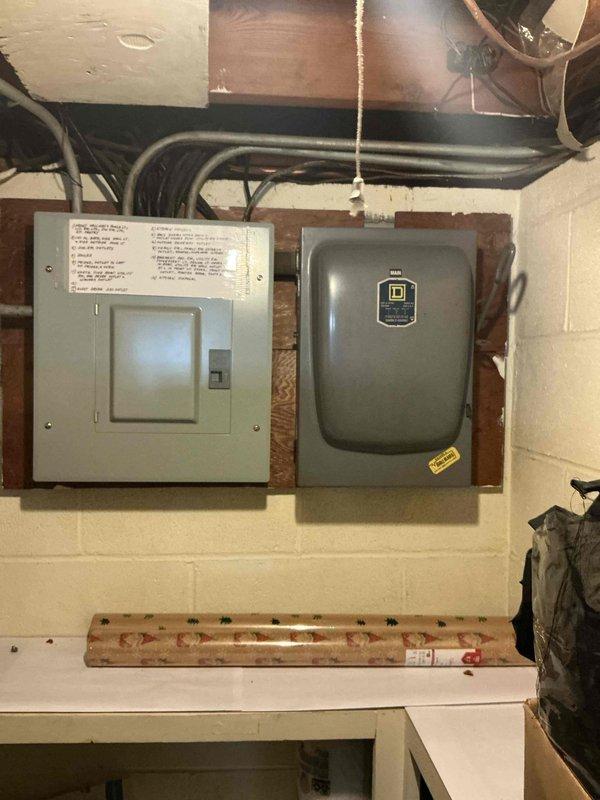 Conducted on-site assessment for mini split installation in residential property currently served by boiler heating system with no existing air conditioning. Evaluated basement utility area including electrical panel locations and available power supply infrastructure, documented existing electrical service capacity and potential installation points. Assessed finished basement space layout and structural considerations for indoor unit placement and refrigerant line routing to determine optimal system configuration and equipment requirements for future mini split HVAC system installation.