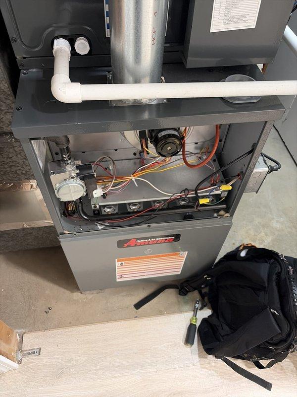 Completed annual preventative maintenance visit on residential HVAC cooling system as part of scheduled service plan. Performed comprehensive inspection of Amana furnace and air handler unit, including examination of internal components, electrical connections, blower motor assembly, and control boards. Accessed unit interior to verify proper operation of all mechanical systems, checked condensate drainage lines, and inspected filter condition. All components found operating within normal parameters and system returned to full operational status.