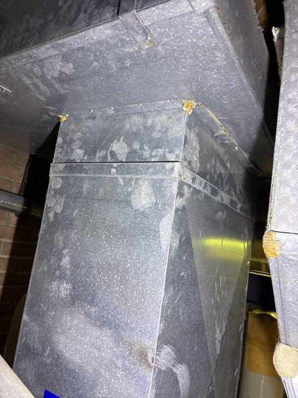 Responded to service call for air conditioning system damaged by ice. Conducted thorough assessment of HVAC system and ductwork in attic space, documenting existing conditions including aged galvanized steel ductwork with visible wear, dust accumulation, and joint sealant deterioration. Provided customer with replacement options for damaged equipment. Created site sketch documenting property layout and equipment location for replacement planning purposes.