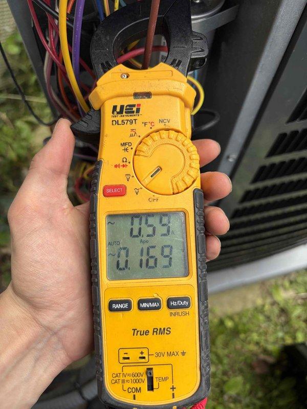Completed scheduled preventative maintenance on residential cooling system. Performed comprehensive inspection of outdoor condenser unit, verified proper electrical operation using digital clamp meter with readings of 0.54A and 0.169A on system components, confirmed capacitor function, and documented equipment condition with no immediate repairs required.