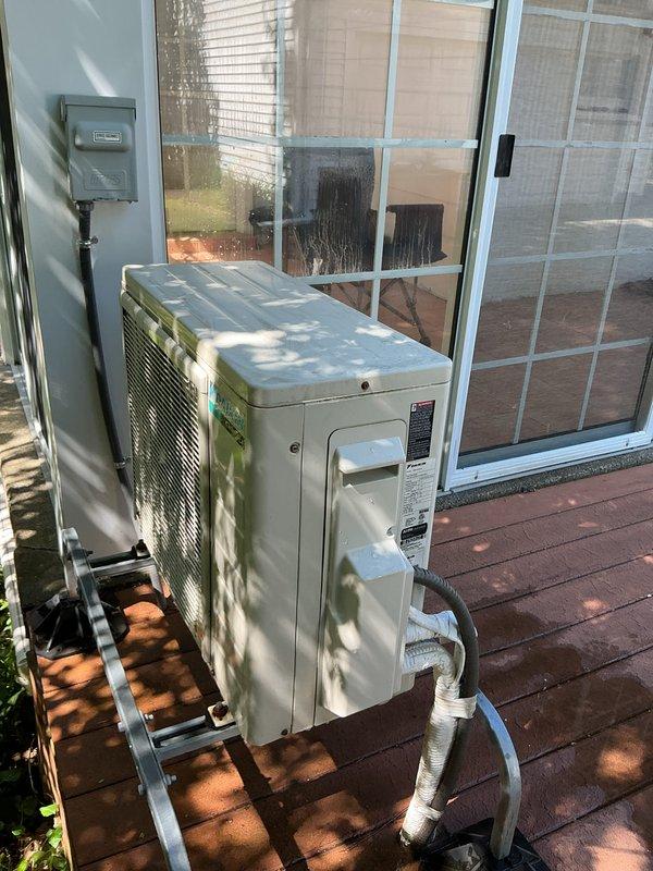 Completed scheduled preventive maintenance on split-system air conditioning unit. Performed comprehensive inspection of wall-mounted indoor evaporator unit and outdoor condensing unit, measuring operating temperature at 24.1°F at the indoor unit using calibrated digital instrumentation. Verified proper refrigerant line insulation integrity, confirmed secure mounting of outdoor condenser on elevated deck brackets, and ensured all system components were operating within manufacturer specifications for optimal cooling performance.
