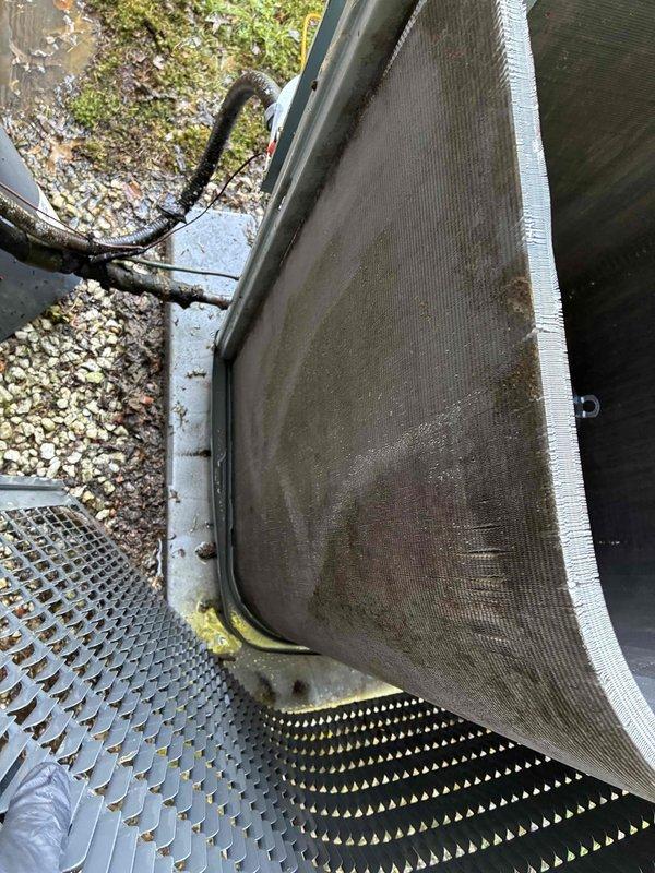 Performed thorough cleaning of heavily soiled condenser coil and blower wheel on residential HVAC system. The condenser coil exhibited significant accumulation of dirt, debris, and organic matter that was restricting airflow and reducing system efficiency. Cleaned all components to restore proper operation and provided quote for hot water tank relief valve replacement.