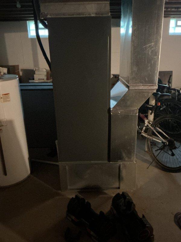 Completed comprehensive cooling maintenance on residential HVAC system located in basement utility area. Performed standard tune-up procedures including inspection of ductwork, air handler components, and associated mechanical systems to ensure optimal performance for the cooling season.