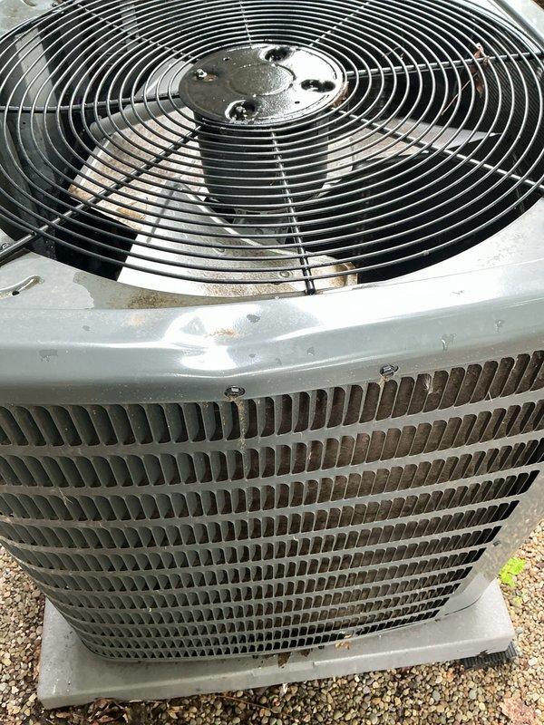 # HVAC Service Report: No Cooling - Residential AC Unit

## Service Call Summary

Responded to service call for 2-year-old outdoor air conditioning unit with no cooling operation. Upon arrival, performed comprehensive diagnostic evaluation of condenser unit to identify cause of system failure.

## Diagnostic Procedures

Conducted visual inspection of outdoor condenser unit, noting overall equipment condition and checking for obvious signs of damage or component failure. Examined fan assembly and protective grille for obstructions or mechanical issues. Inspected condenser coil fins for blockages, damage, or excessive debris accumulation that could restrict airflow and prevent proper heat exchange.

Verified electrical connections at unit and checked for tripped breakers or disconnected power supply. Tested capacitor function to ensure proper motor operation. Evaluated fan motor operation and blade rotation. Measured refrigerant pressures on both high and low sides of system to determine