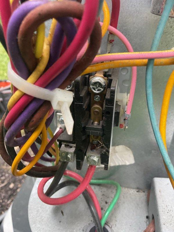 Completed comprehensive cooling system maintenance on residential HVAC unit. Performed thorough inspection of furnace/air handler assembly, verified proper electrical connections at control terminal block with multi-circuit wiring configuration, and confirmed all safety shut-off valves and PVC drainage lines were functioning correctly. All components operating within normal parameters with no deficiencies noted.
