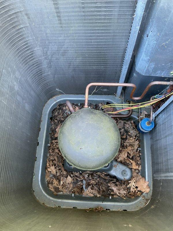 Completed cooling system tune-up on residential HVAC unit. Inspected outdoor condensing unit, verified refrigerant lines and electrical connections, cleared debris from drain pan, and measured supply air temperature at 48.3°F indicating proper system operation. Unit operating within normal parameters upon completion of preventive maintenance service.