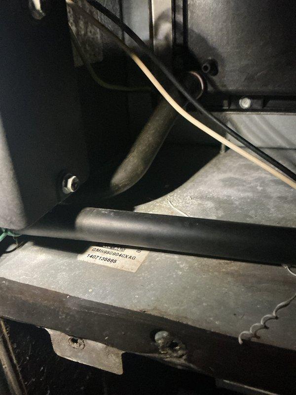 Responded to customer complaint of loud noise coming from air conditioning system. Upon arrival, performed diagnostic inspection of HVAC unit and identified source of noise. Inspected compressor assembly, refrigerant lines, and associated mechanical components. Verified unit model GXMH8D094CXAG and documented equipment condition. System noise issue resolved and unit returned to normal operation.