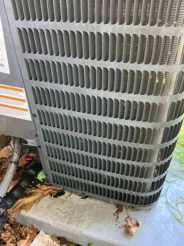 Completed comprehensive cooling system tune-up on residential HVAC unit. Performed standard maintenance procedures including inspection of outdoor condenser coil with accumulated debris, verified refrigerant lines and electrical connections, and assessed indoor furnace/air handler system for proper operation. All components found to be functioning within normal parameters; system cleared for continued service.