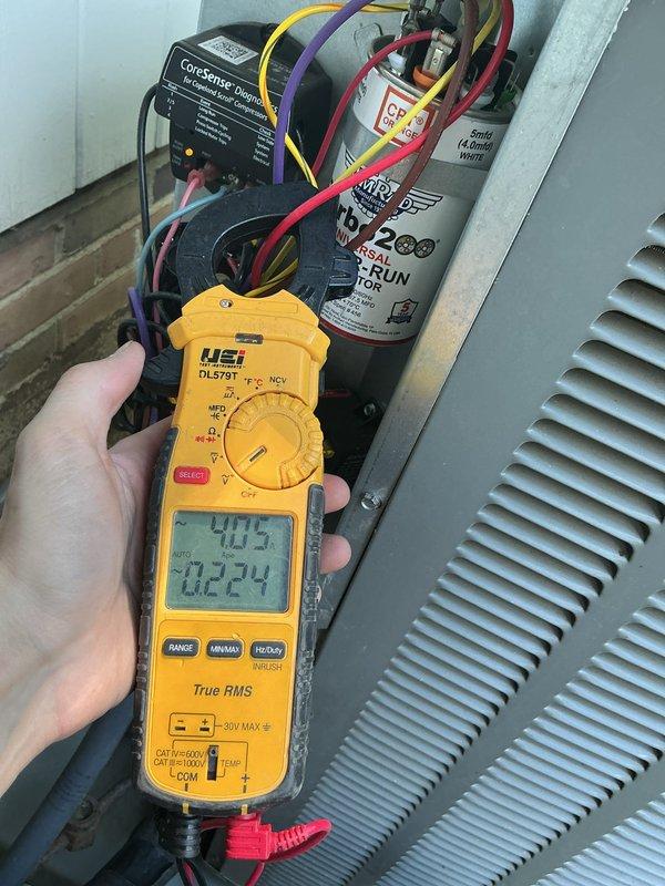 Completed scheduled cooling system maintenance on residential HVAC unit. Performed comprehensive system diagnostics using digital multimeter to verify electrical performance, measuring voltage and amperage readings on compressor and blower motor circuits. All electrical components tested within manufacturer specifications, with readings indicating proper system operation at 40.5 amps and appropriate voltage levels. Inspected condenser coil, evaporator components, and all electrical connections including capacitor and control board functionality. Applied appropriate maintenance lubrication to moving components as needed. Provided customer with replacement air filter as requested per maintenance agreement requirements.