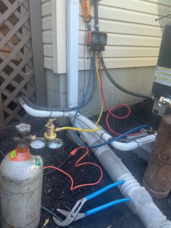 Replaced failed compressor on residential air conditioning system. Recovered refrigerant using recovery machine, removed defective compressor, installed new compressor unit, pressure tested system for leaks, evacuated system with vacuum pump, and recharged with proper refrigerant charge per manufacturer specifications. System tested and operational upon completion.