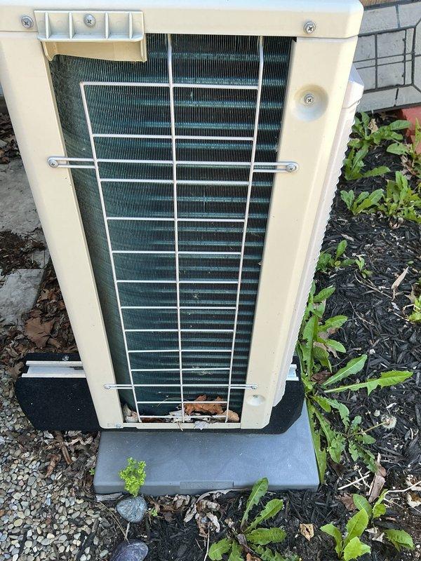 Performed routine cooling maintenance on outdoor condensing unit. Inspected condenser coil and found significant accumulation of dust, lint, and debris blocking airflow through the fins and ventilation grilles. Cleaned condenser coil and exterior surfaces to restore proper airflow and system efficiency.