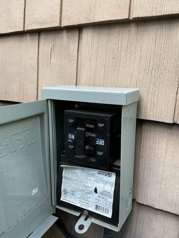Completed routine preventative maintenance on residential cooling system. Inspected outdoor condensing unit electrical components including disconnect switch, dual-run capacitor, and CoreSense diagnostic module for Copeland Scroll compressor, confirming all connections secure and components operating within normal parameters.