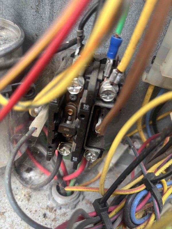 Completed comprehensive cooling system tune-up on residential HVAC unit. Performed electrical diagnostics using digital multimeter, verified proper voltage and amperage readings at control board terminal connections, and inspected all wire terminations and capacitor connections for secure operation. All components tested within normal operating parameters and system confirmed ready for cooling season.