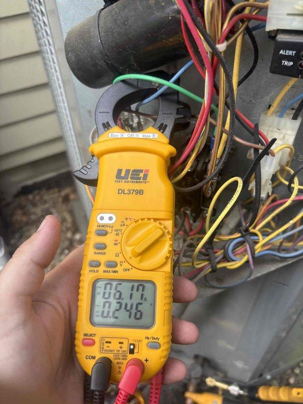 Completed comprehensive cooling system tune-up on residential HVAC unit. Performed electrical diagnostics using digital multimeter, verified proper voltage and amperage readings at control board terminal connections, and inspected all wire terminations and capacitor connections for secure operation. All components tested within normal operating parameters and system confirmed ready for cooling season.