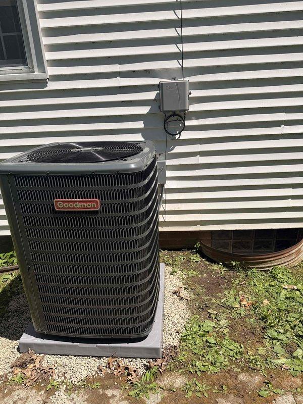 Completed installation of new Goodman air conditioning system. Installed outdoor condensing unit on concrete pad with proper electrical disconnect and conduit routing, then installed evaporator coil and performed system evacuation and refrigerant charging procedures, verifying proper operating temperatures and pressures with digital manifold gauges to ensure optimal system performance.