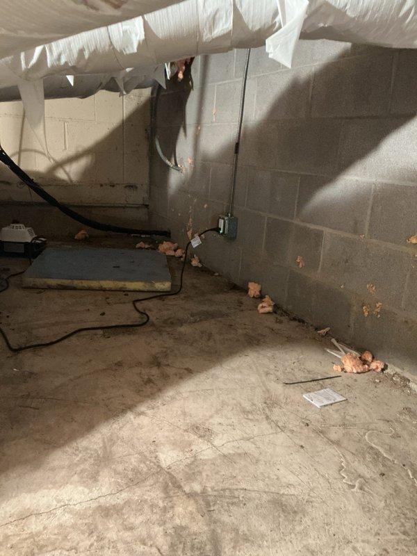 Installed new electrical outlet in crawl space area, running appropriate wiring and conduit to provide power access in the unfinished utility space. Mounted outlet box to concrete block wall and ensured proper grounding and code-compliant installation for safe operation in below-grade environment.