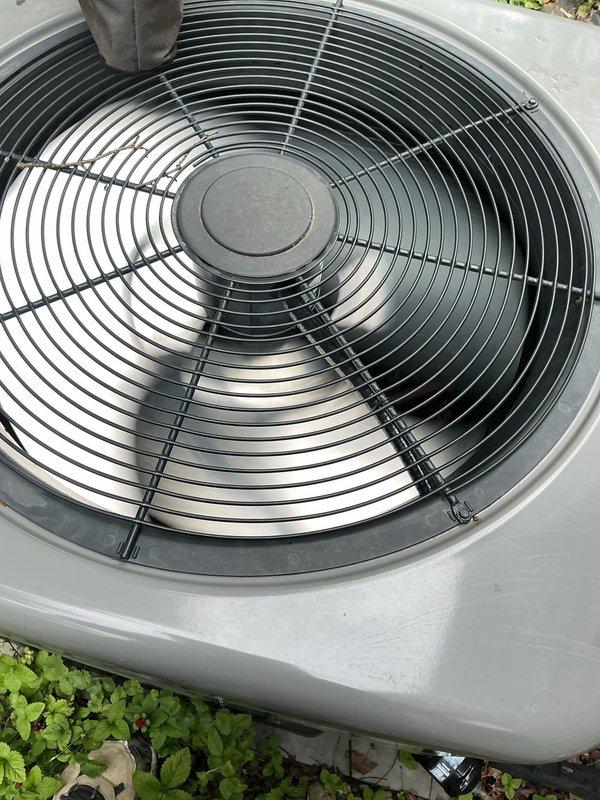 # HVAC Cooling System Maintenance

Performed comprehensive preventive maintenance on outdoor air conditioning unit. Conducted thorough inspection of condenser fan assembly, verifying proper operation of fan motor and blade configuration. Examined protective wire guard for structural integrity and secure mounting. Assessed electrical components including capacitor and contactor relay, checking all wire connections and terminals for proper contact and signs of wear. Verified capacitor specifications and tested electrical connections across multiple circuits. Inspected unit housing for weathering damage and confirmed adequate clearance from surrounding vegetation. System operational and functioning within normal parameters upon completion of maintenance service.
