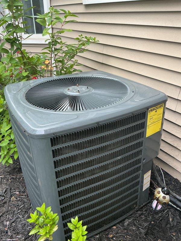 Completed scheduled preventive maintenance on residential split-system air conditioning unit. Performed comprehensive inspection of outdoor condenser unit, confirming proper operation of compressor and condenser fan motor. Verified refrigerant lines and service valves showed no signs of leakage or damage. Inspected electrical connections and disconnect box for secure mounting and proper function. Condenser coils were clean with adequate airflow and no debris accumulation present. Unit operating within normal parameters with no immediate service needs identified.