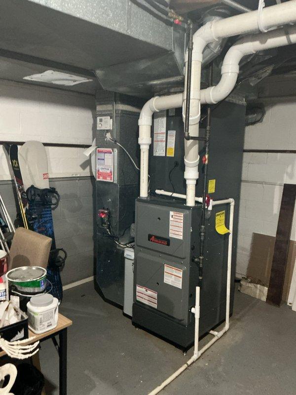 Completed scheduled preventative maintenance on residential cooling system. Performed comprehensive inspection of indoor furnace unit and associated components in mechanical room, verifying proper operation of blower assembly, checking electrical connections, and inspecting condensate drainage system with PVC piping. Proceeded to outdoor unit where electrical disconnect box was inspected and tested for proper functionality. Confirmed disconnect switch operates correctly and all wiring connections are secure within the exterior-mounted enclosure. System tested and operating within normal parameters upon completion of maintenance service.