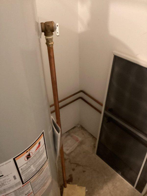 Responded to second callback for leaking relief valve on copper piping system. Upon inspection, identified active leak at brass relief valve fitting located on vertical copper supply line in utility area. Replaced defective relief valve with new unit, ensuring proper seating and seal integrity. Tested system under full operating pressure to verify leak elimination and confirm proper valve function.