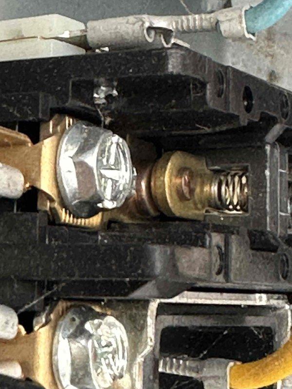 Completed routine HVAC tune-up on residential system. Inspected gas valve connections and burner assembly, confirming proper operation and secure fittings. Performed diagnostic measurements using digital meter and assessed overall system performance in mechanical space.
