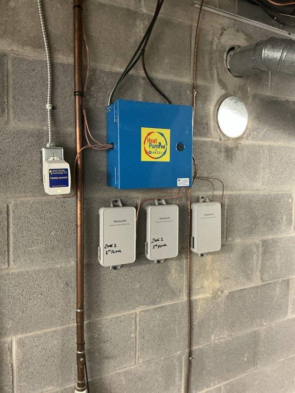 Completed comprehensive cooling season maintenance on multi-zone heat pump system with P.K. Wadsworth furnace and Heat Pump Pro control system. Inspected all three zones including first and second floor Honeywell zone controls, verified proper operation of control board and system components, checked refrigerant lines and condensate drainage, and confirmed all electrical connections were secure. System tested and operating within normal parameters for the cooling season.