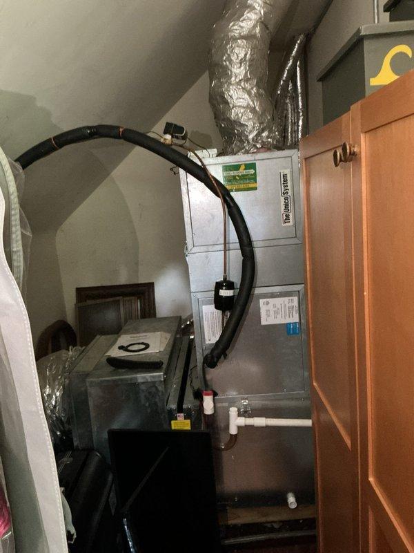 Responded to no cooling complaint on residential air conditioning system. Upon arrival, inspected outdoor condensing unit and found failed dual run capacitor preventing compressor and condenser fan motor operation. Removed access panel, tested capacitor with multimeter confirming zero capacitance on both common and fan terminals. Replaced defective capacitor with proper MFD-rated component, verified all electrical connections secure, and restored power to system. Confirmed compressor and condenser fan motor startup, monitored system operation through complete cooling cycle, and verified proper airflow at indoor air handler. System restored to normal cooling operation.
