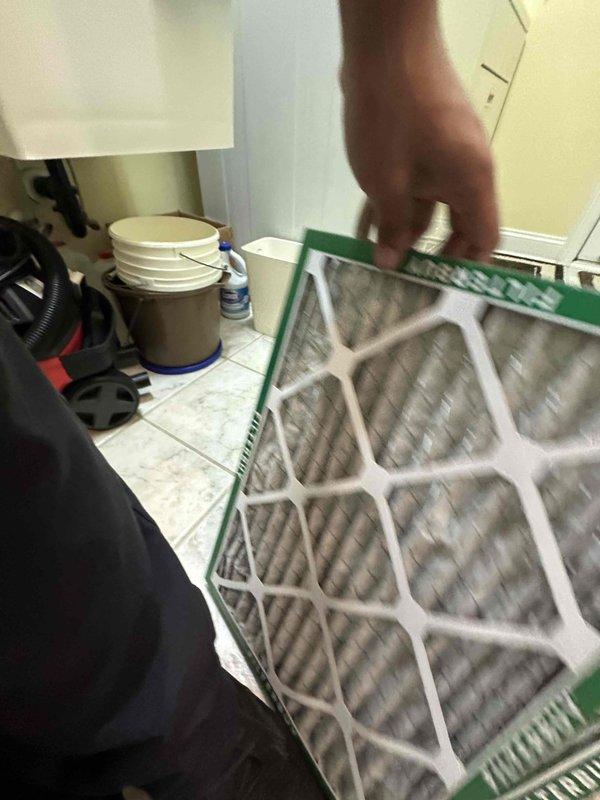 Completed seasonal cooling maintenance on residential HVAC system. Performed electrical diagnostics on condensing unit using digital multimeter, confirming proper voltage readings. Inspected and replaced heavily soiled air filter with significant dust and debris accumulation. Customer declined optional electrical inspection services.