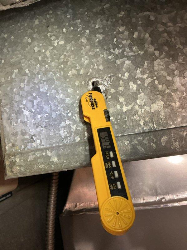 Completed preventive maintenance inspection on residential cooling system. Performed diagnostic testing using digital instruments, inspected outdoor unit electrical components including capacitor and contactor assembly, verified proper wire connections and control operation. System found operating within normal parameters with all electrical connections secure and components functioning properly.