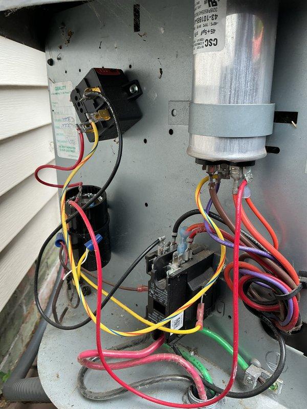 Completed preventive maintenance inspection on residential cooling system. Performed diagnostic testing using digital instruments, inspected outdoor unit electrical components including capacitor and contactor assembly, verified proper wire connections and control operation. System found operating within normal parameters with all electrical connections secure and components functioning properly.