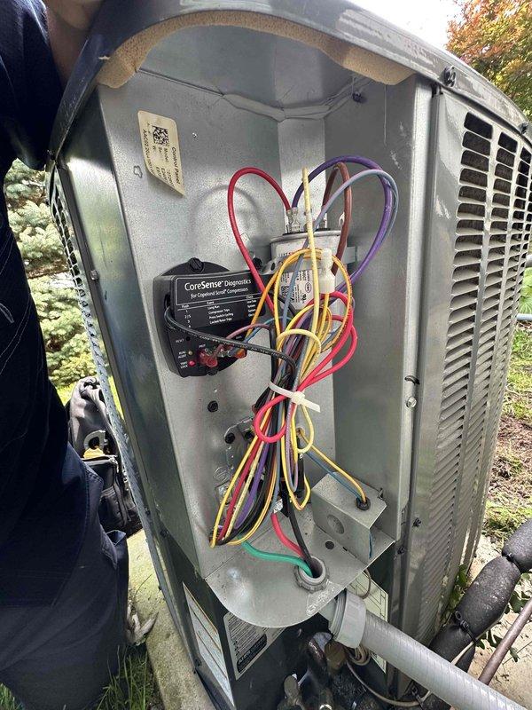 Completed annual preventive maintenance visit on residential cooling system. Performed comprehensive inspection of outdoor condensing unit, including electrical connections, control components, and internal wiring. Utilized CoreSense diagnostic equipment to assess system performance and verify proper operation of all electrical terminals and connections. All components found to be functioning within normal parameters, and unit was returned to service.