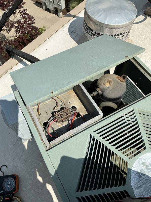Completed comprehensive cooling season tune-up on rooftop HVAC unit. Performed full system inspection including thermostat verification, electrical component testing, ductwork assessment, and internal mechanical examination of compressor, refrigerant lines, and blower assembly. Unit operational with all components functioning within normal parameters.