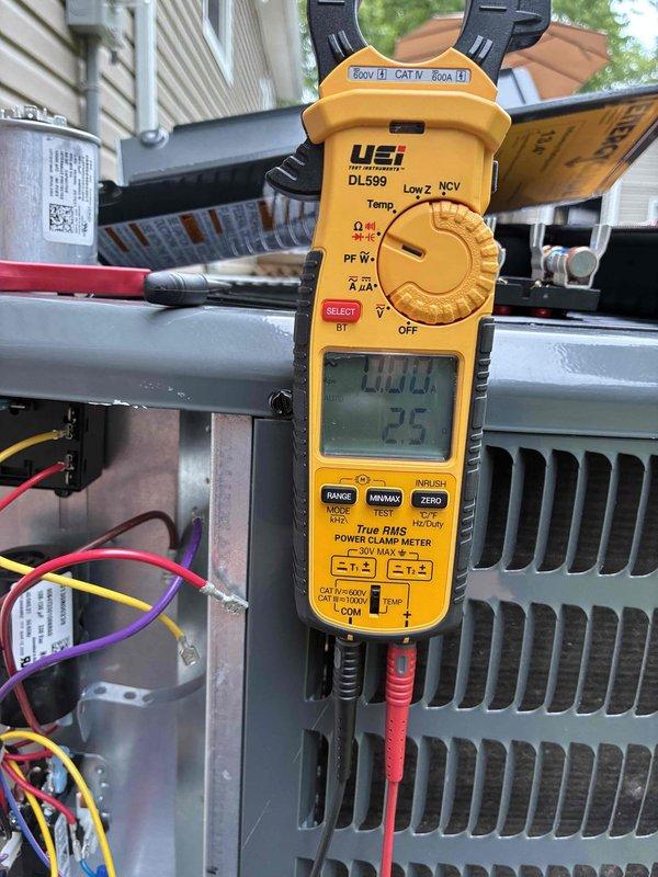Responded to no cooling complaint on residential air conditioning system. Upon arrival, performed electrical diagnostics on outdoor condensing unit using clamp meter to measure voltage and amperage. Tested compressor and fan motor electrical values to verify proper operation and identify cause of cooling failure. System evaluated and measurements documented for repair recommendations.