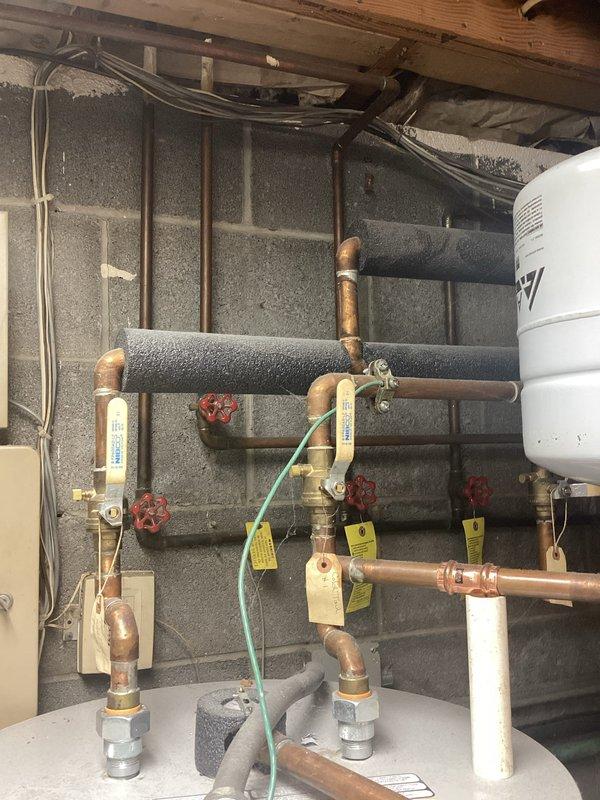 Conducted comprehensive electrical assessment for electric vehicle charging station installation in residential garage. Evaluated existing electrical panel capacity, circuit availability, and optimal mounting location for Level 2 EV charger. Documented current garage electrical infrastructure, including wire routing pathways from main service panel through basement utility area to proposed charging station location. Photographed existing conditions to support load calculation requirements and permit application process for future installation.