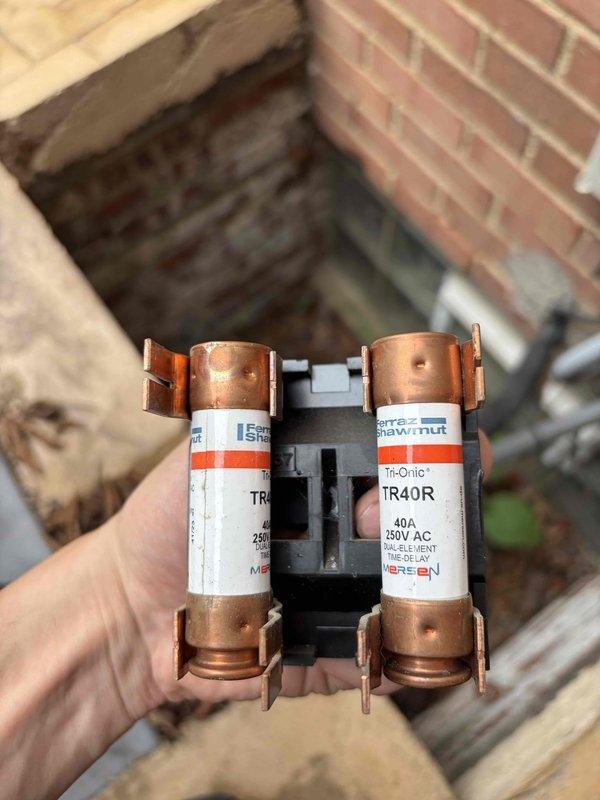 Completed scheduled HVAC cooling maintenance on system. Inspected and tested electrical components, including 40-amp 250V Tri-Onic fuses which were found in proper working condition. Performed electrical diagnostics using clamp meter to verify system amperage and voltage readings at gas valve connections, confirming all measurements within normal operating parameters.