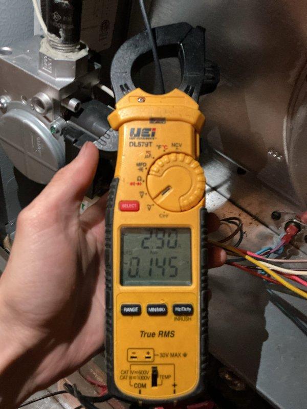 Completed scheduled HVAC cooling maintenance on system. Inspected and tested electrical components, including 40-amp 250V Tri-Onic fuses which were found in proper working condition. Performed electrical diagnostics using clamp meter to verify system amperage and voltage readings at gas valve connections, confirming all measurements within normal operating parameters.