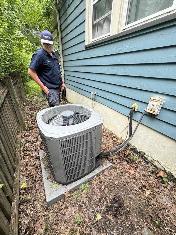 Responded to a no-cooling complaint on an 11-year-old air conditioning system where indoor air circulation was normal but the outdoor condenser unit failed to operate. Performed comprehensive diagnostic inspection including verification of electrical supply at main breaker panel, outdoor disconnect box, and unit wiring connections—all confirmed operational. Inspected refrigerant lines for freeze conditions with negative findings.

Upon accessing the outdoor unit's electrical compartment, identified significant debris accumulation within the housing that had collected over time. Conducted visual inspection of internal components including the dual-run capacitor, contactor assembly, compressor terminals, and condenser fan motor connections. All electrical connections appeared secure with no visible signs of wire damage or corrosion at terminal points.

The outdoor unit showed typical wear patterns consistent with its age, with the condenser coil exhibiting normal outdoor exposure. Refrig