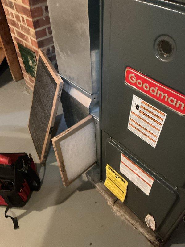 Completed cooling tune-up on Goodman HVAC system, including inspection of indoor furnace unit and outdoor condenser. Performed standard maintenance procedures, checked system operation, inspected air filter assembly, and verified condenser coil condition and airflow through protective grille.