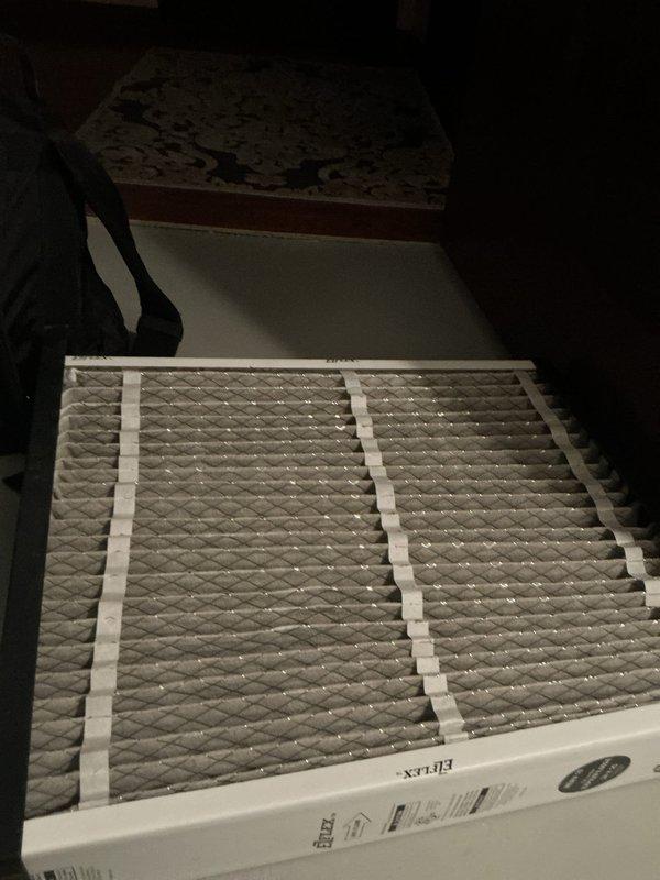 Completed seasonal cooling tune-up maintenance on residential HVAC system. Inspected and documented existing air filter condition, which showed moderate dust accumulation and discoloration indicating normal usage. System operational and ready for cooling season.