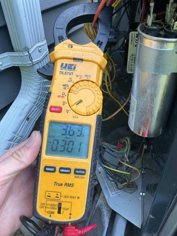 Completed seasonal tune-up on residential HVAC system including furnace and condensing unit inspection. Performed electrical diagnostics using clamp meter to verify amp draw on condenser unit, tested capacitor operation, and confirmed all electrical connections were secure. Cleaned and inspected both indoor and outdoor equipment, verified proper airflow, and ensured system is operating within manufacturer specifications.