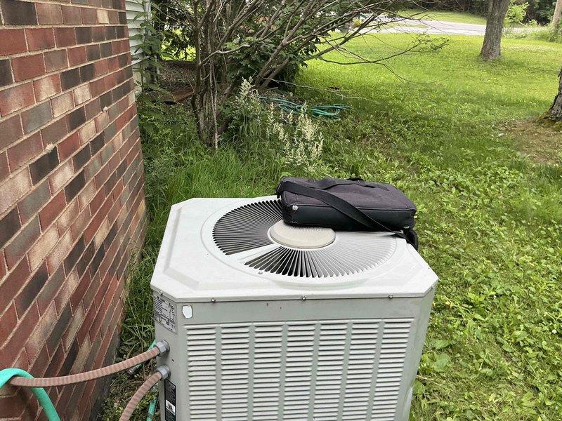 Conducted comprehensive evaluation of existing HVAC system for replacement estimate. Assessed outdoor condensing unit positioned on ground-level pad adjacent to structure, noting current equipment configuration and accessibility for future installation. Evaluated interior mechanical space containing existing air handler, ductwork connections, gas lines with shut-off valves, and associated plumbing infrastructure. Documented system layout including flexible duct runs, copper refrigerant lines, PVC drainage piping, and electrical conduit routing through basement area. Provided customer with replacement options based on site conditions and confirmed easy access for equipment changeout.