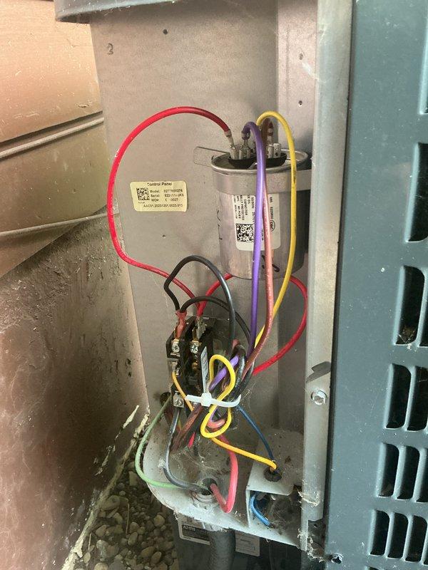 Completed routine cooling maintenance on outdoor condensing unit over 10 years old. Inspected electrical components including capacitor and contactor, verified proper wire connections, and documented equipment condition with normal operational wear and dust accumulation. Customer reported separate ongoing issue with mini-split system from previous service visit requiring no cool air, which was noted for follow-up as it is a different unit than the one serviced during this maintenance call.