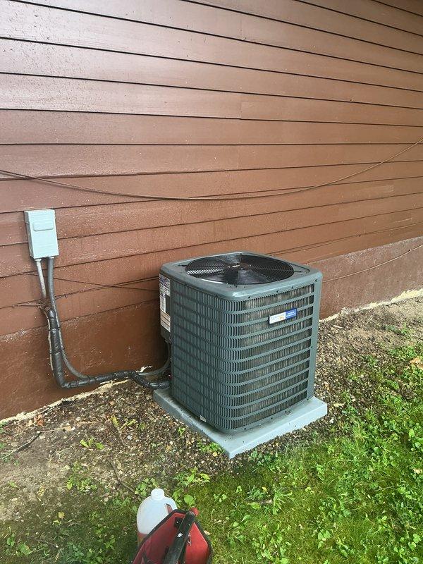 Completed routine cooling maintenance on outdoor condensing unit over 10 years old. Inspected electrical components including capacitor and contactor, verified proper wire connections, and documented equipment condition with normal operational wear and dust accumulation. Customer reported separate ongoing issue with mini-split system from previous service visit requiring no cool air, which was noted for follow-up as it is a different unit than the one serviced during this maintenance call.