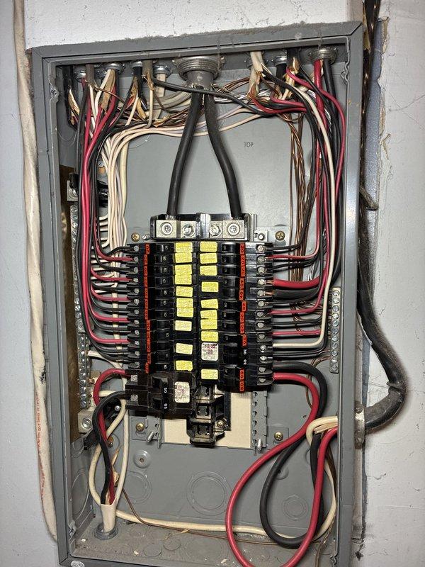 Completed installation of heat pump system with air handler and humidifier. Installed 60-amp double-pole circuit breakers in main electrical panel to provide dedicated power supply for new HVAC equipment. Ran electrical conductors from panel to equipment locations, terminated all connections at breaker terminals and load-side terminal lugs, and verified proper wire sizing and circuit protection for heat pump specifications.