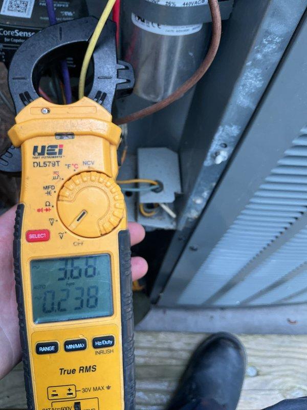 Performed comprehensive cooling system maintenance on residential HVAC unit. Conducted electrical diagnostics using digital multimeter to verify proper voltage and amperage readings at the outdoor condensing unit, measuring capacitor performance and compressor draw. Inspected indoor air handler components in attic space, verifying proper operation of all electrical connections and refrigerant line integrity throughout the system.